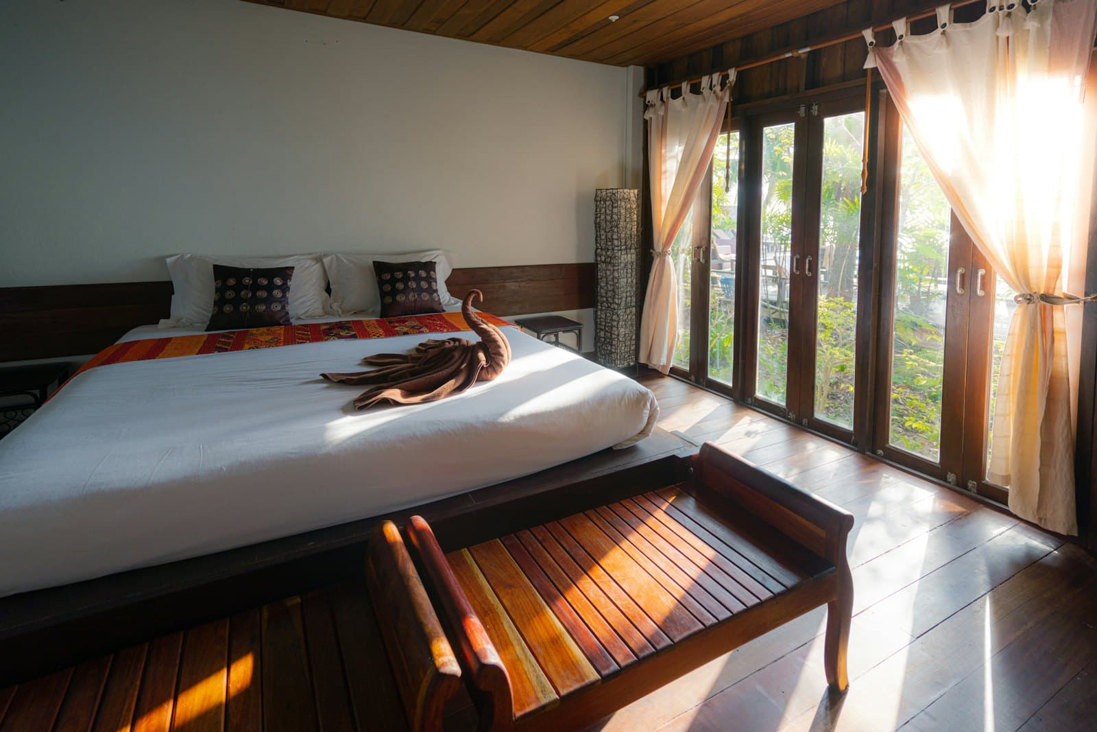 Hotel bedroom with wooden furniture